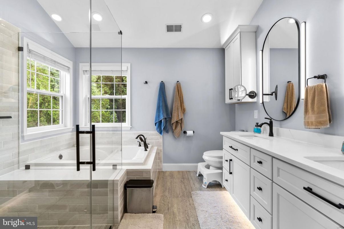 Bathroom, Dual Sink Vanities, Glass Shower, Interior, Recessed Lighting, Wood Texture Flooring