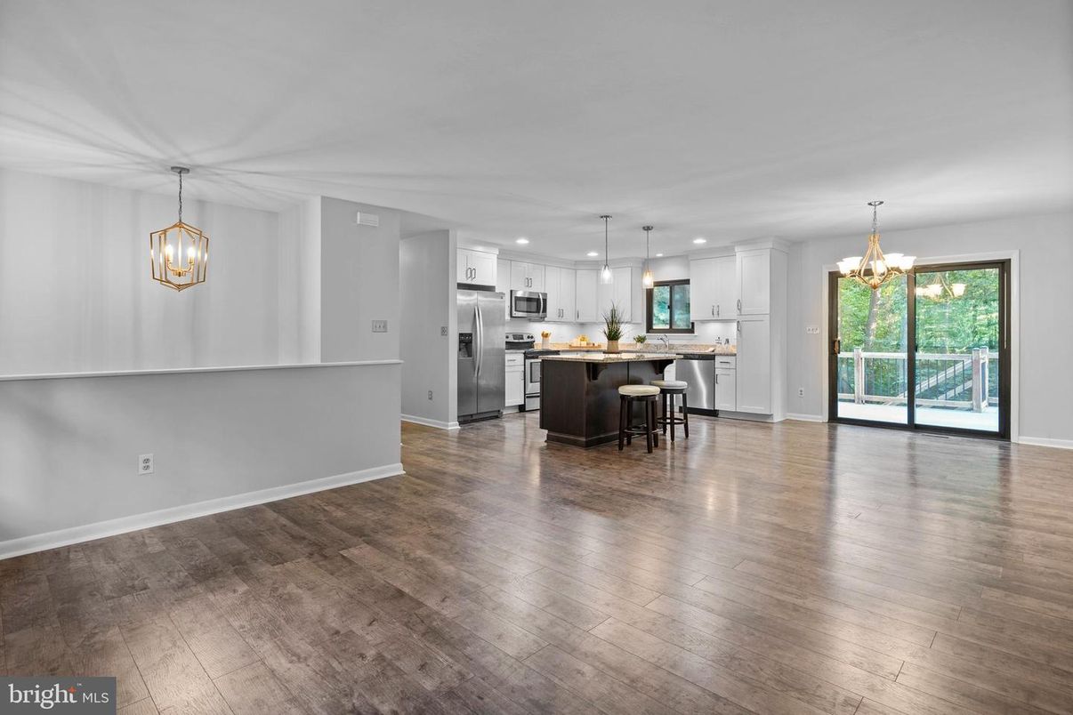 Chandelier, Interior, Kitchen, Pendant Lights, Recessed Lighting, Stainless Steel Appliances, Wood Texture Flooring