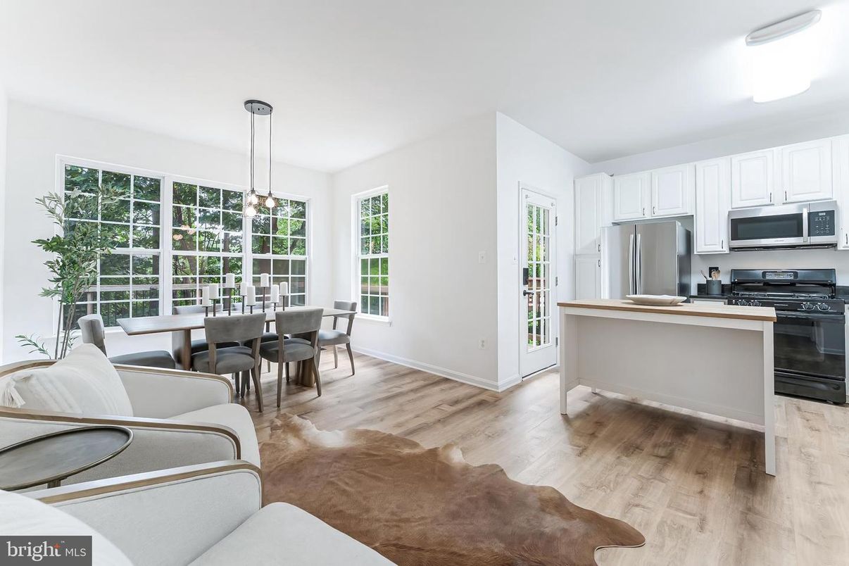 Dining room, Interior, Kitchen, Pendant Lights, Stainless Steel Appliances, Wood Texture Flooring