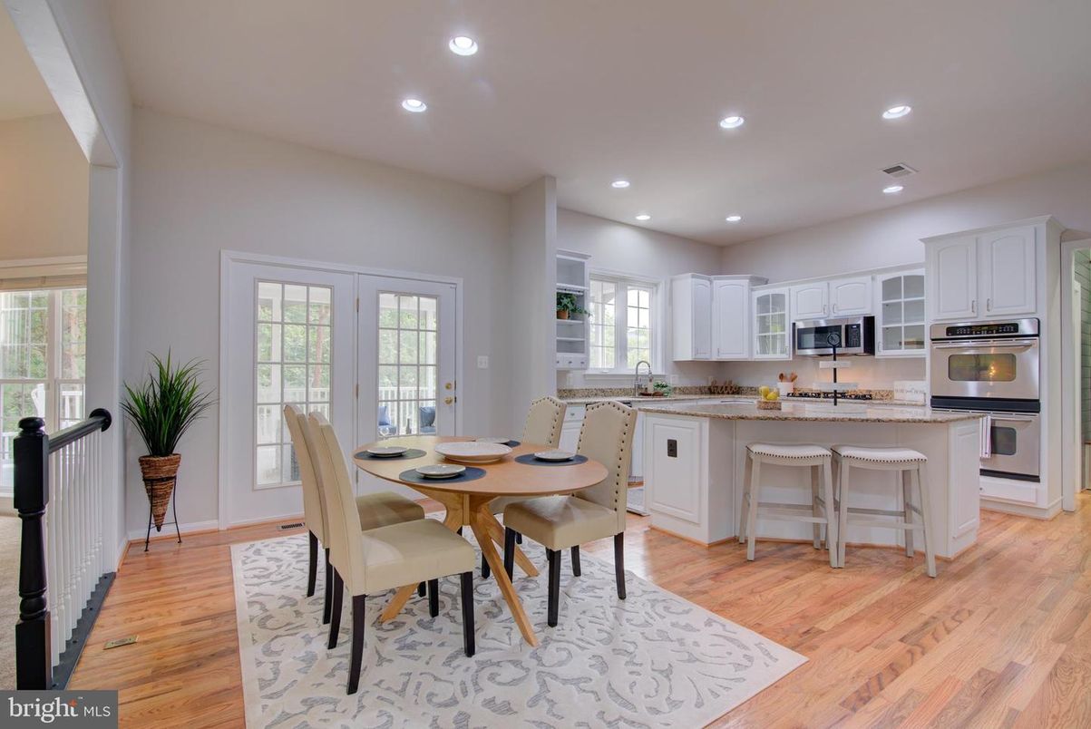 Dining room, Interior, Kitchen, Recessed Lighting, Stainless Steel Appliances, Wood Texture Flooring