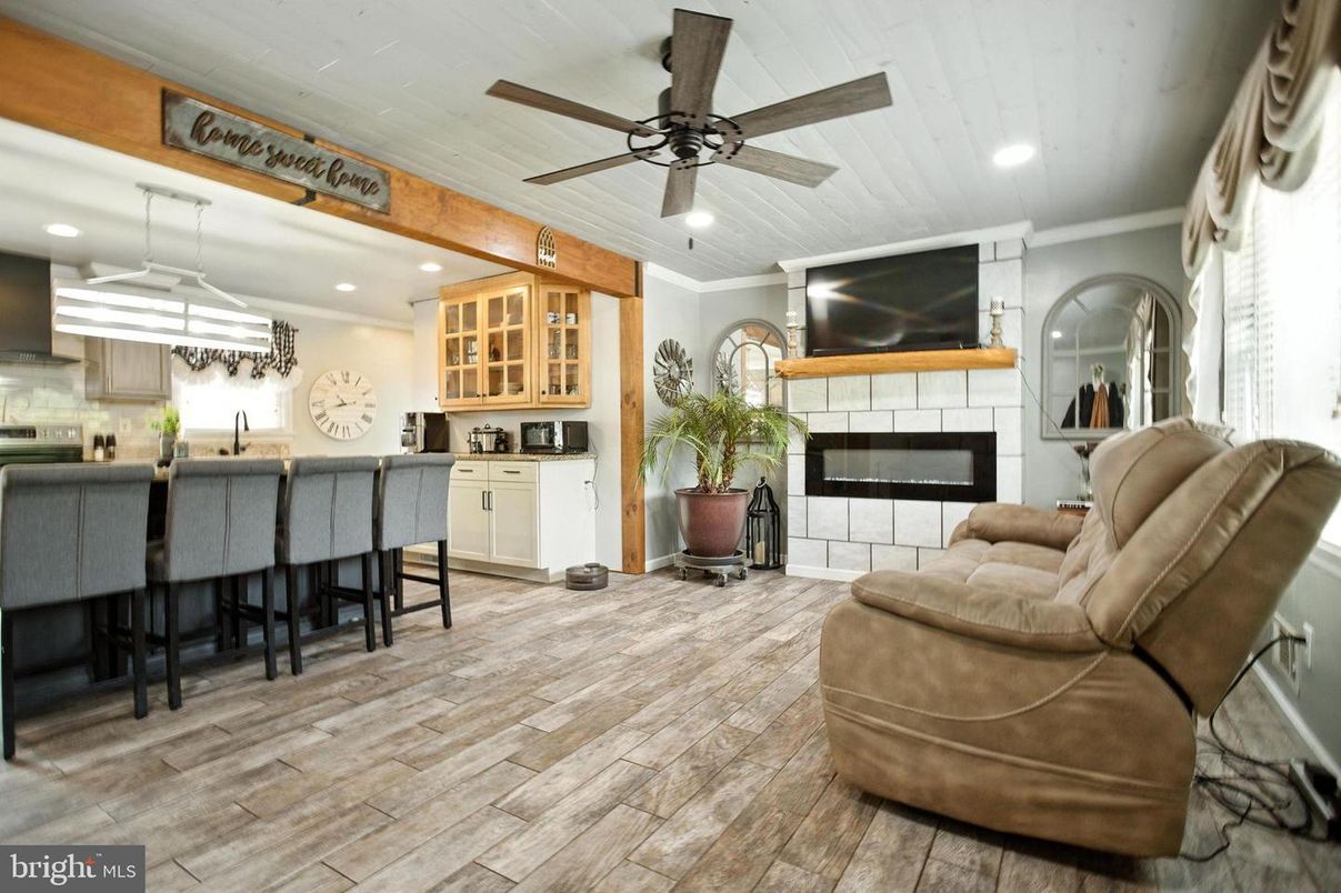 Fireplace, Interior, Kitchen, Living room, Recessed Lighting, Wood Texture Flooring