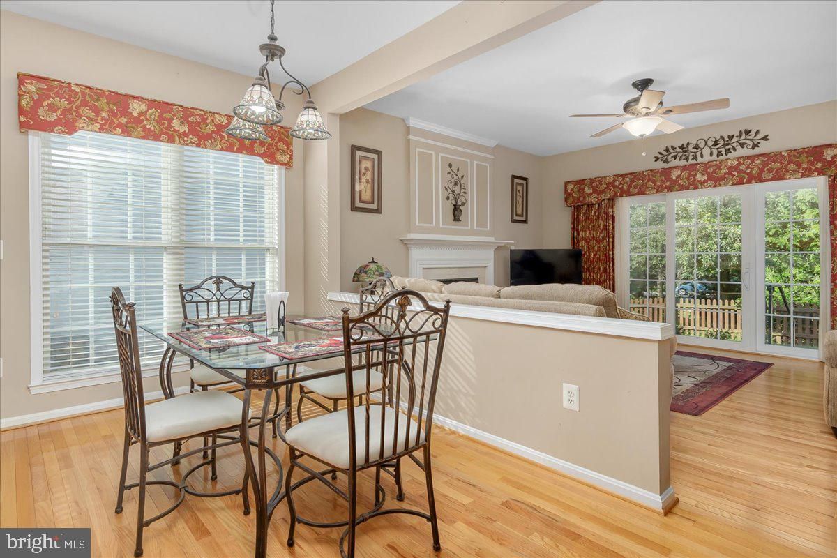 Dining room, Fireplace, Interior, Living room, Pendant Lights, Wood Texture Flooring