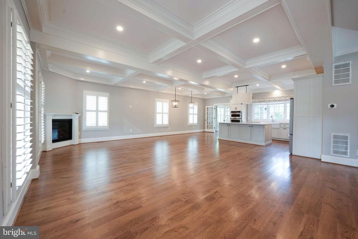 Empty room, Fireplace, Interior, Kitchen, Pendant Lights, Recessed Lighting, Wood Texture Flooring