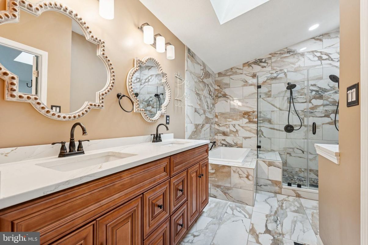 Bathroom, Dual Sink Vanities, Glass Shower, Interior, Marble, Marble Walls, Recessed Lighting