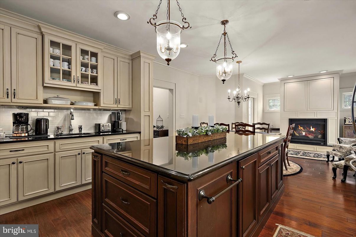 Chandelier, Dining room, Fireplace, Interior, Kitchen, Pendant Lights, Recessed Lighting, Wood Texture Flooring