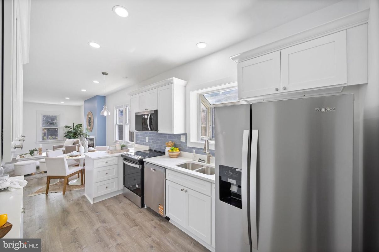 Dining room, Interior, Kitchen, Living room, Recessed Lighting, Stainless Steel Appliances, Wood Texture Flooring