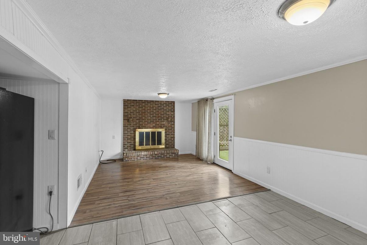 Empty room, Fireplace, Interior, Stone Walls, Wood Texture Flooring