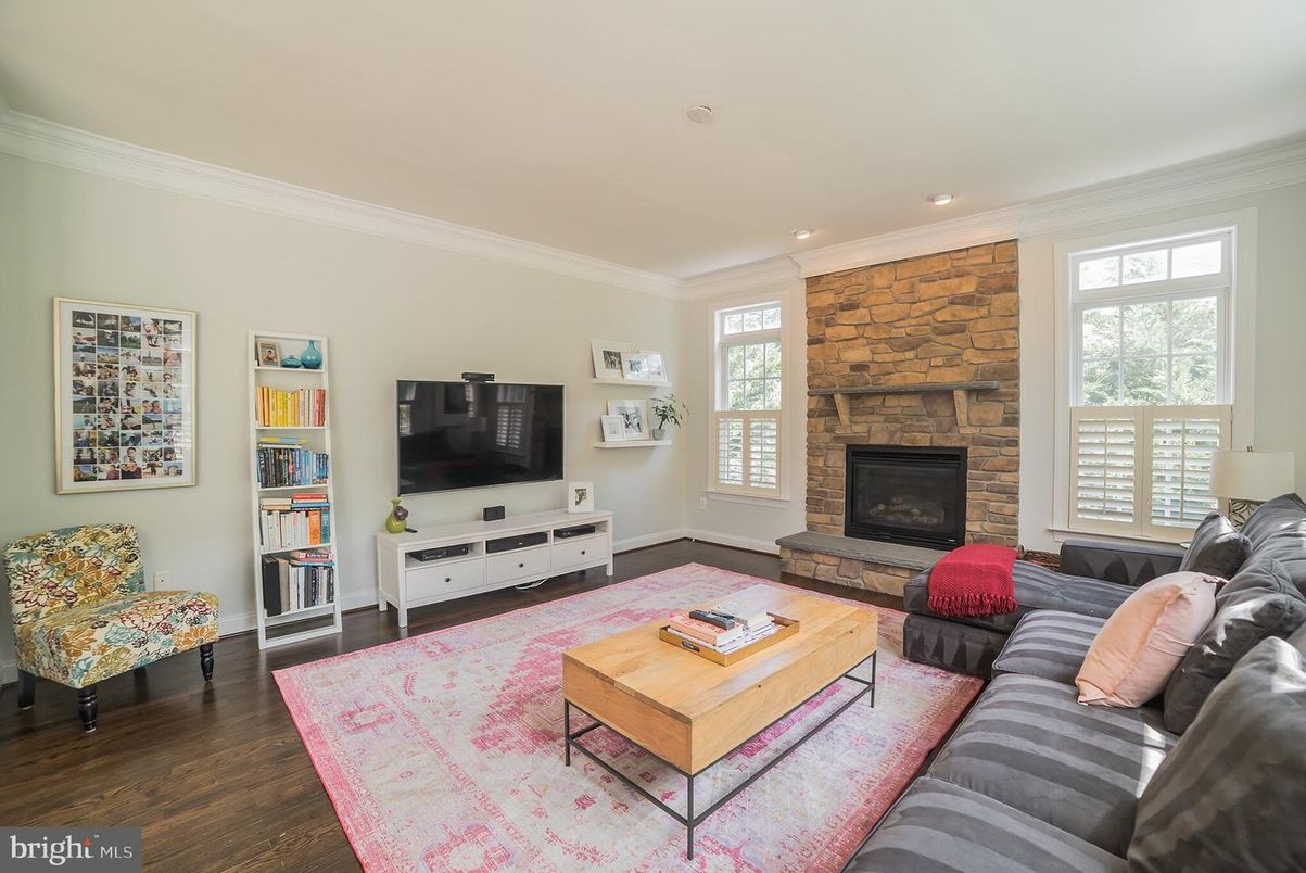 Fireplace, Interior, Living room, Recessed Lighting, Stone Walls, Wood Texture Flooring