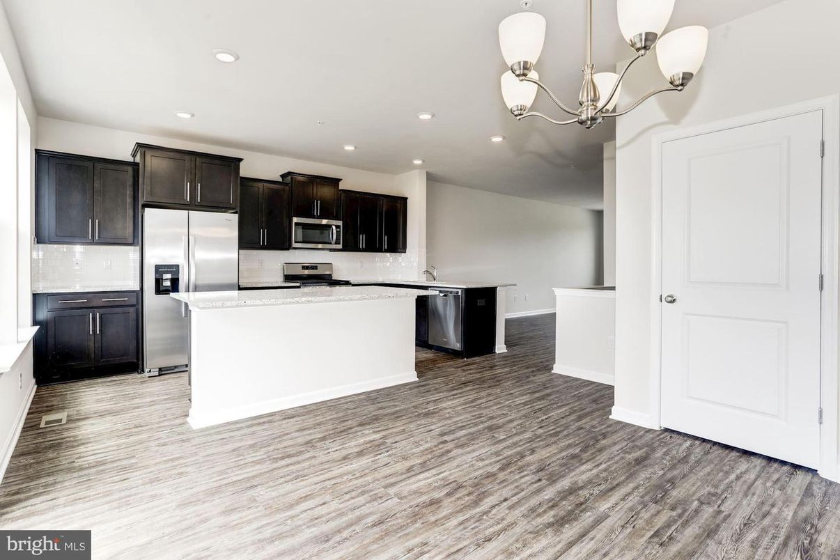 Chandelier, Interior, Kitchen, Recessed Lighting, Stainless Steel Appliances, Wood Texture Flooring
