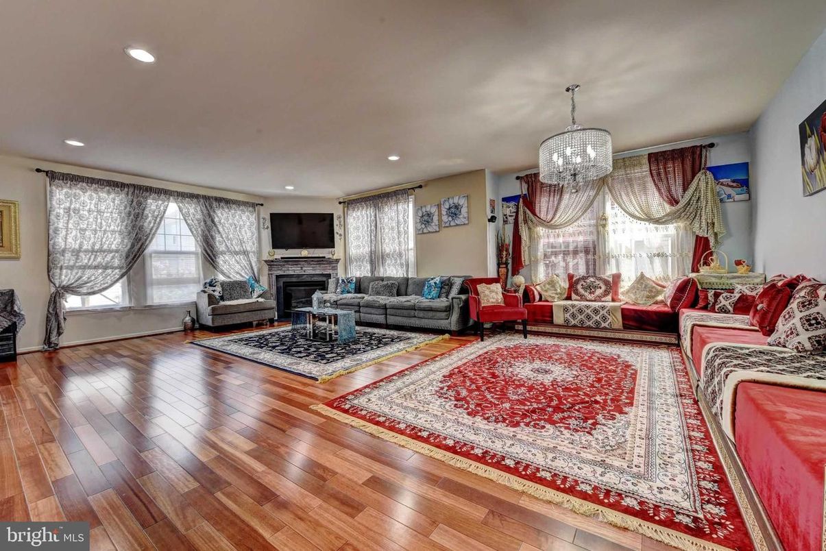 Chandelier, Fireplace, Interior, Living room, Recessed Lighting, Wood Texture Flooring