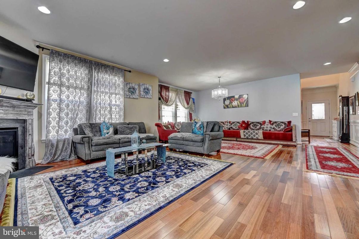 Chandelier, Fireplace, Interior, Living room, Recessed Lighting, Wood Texture Flooring