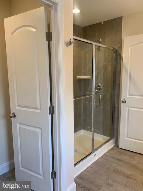 Bathroom, Glass Shower, Interior, Recessed Lighting, Wood Texture Flooring