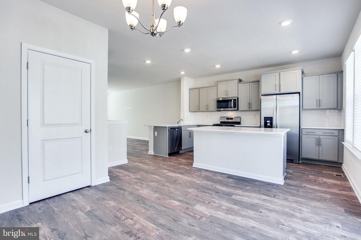 Chandelier, Interior, Kitchen, Recessed Lighting, Stainless Steel Appliances, Wood Texture Flooring