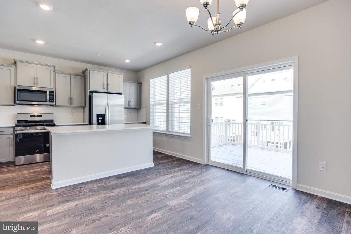 Chandelier, Interior, Kitchen, Recessed Lighting, Stainless Steel Appliances, Wood Texture Flooring