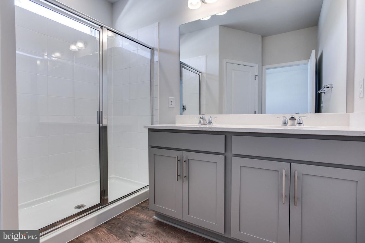 Bathroom, Dual Sink Vanities, Glass Shower, Interior, Wood Texture Flooring