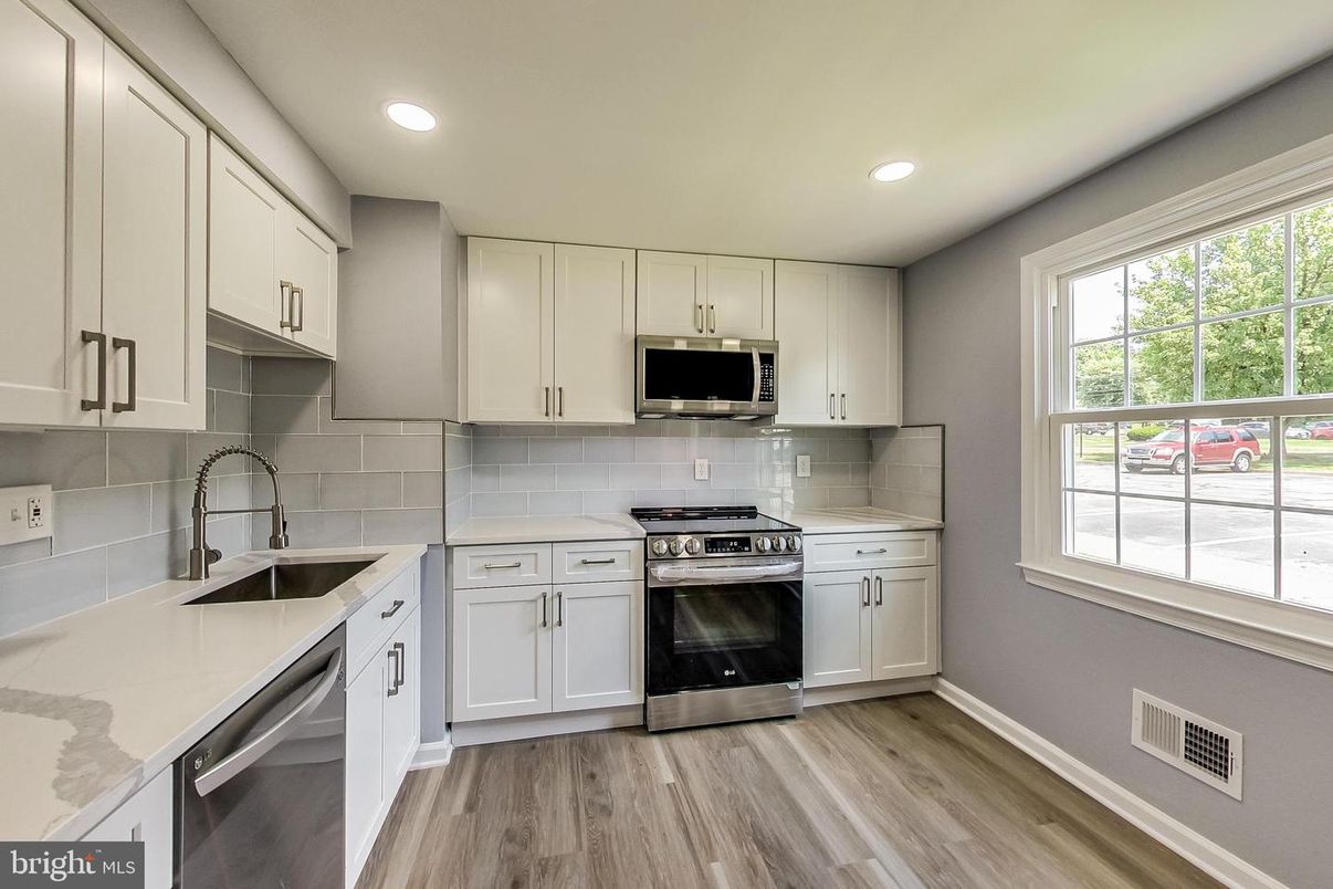 Interior, Kitchen, Recessed Lighting, Stainless Steel Appliances, Wood Texture Flooring
