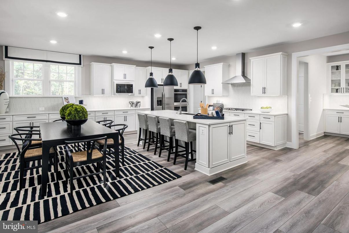 Dining room, Interior, Kitchen, Pendant Lights, Recessed Lighting, Stainless Steel Appliances, Wood Texture Flooring