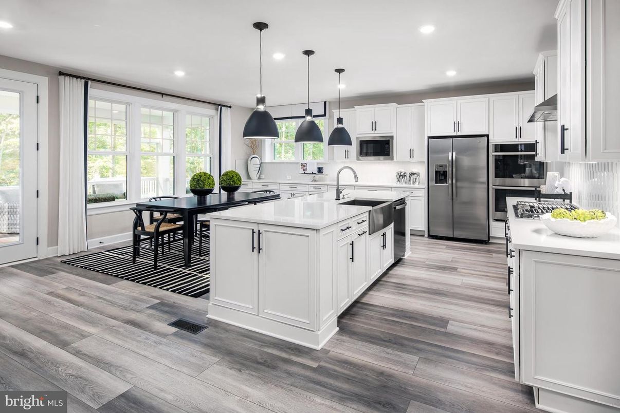 Dining room, Interior, Kitchen, Pendant Lights, Recessed Lighting, Stainless Steel Appliances, Wood Texture Flooring