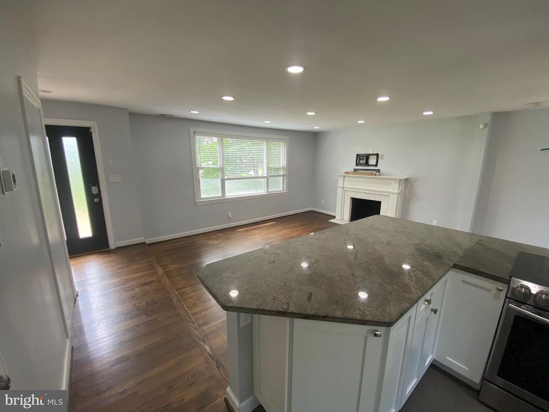 Fireplace, Interior, Kitchen, Recessed Lighting, Wood Texture Flooring