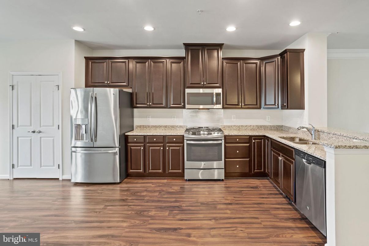 Interior, Kitchen, Recessed Lighting, Stainless Steel Appliances, Wood Texture Flooring