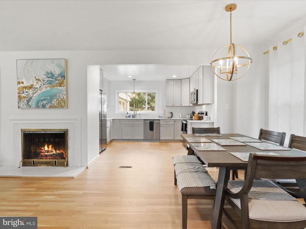 Dining room, Fireplace, Interior, Kitchen, Pendant Lights, Recessed Lighting, Wood Texture Flooring