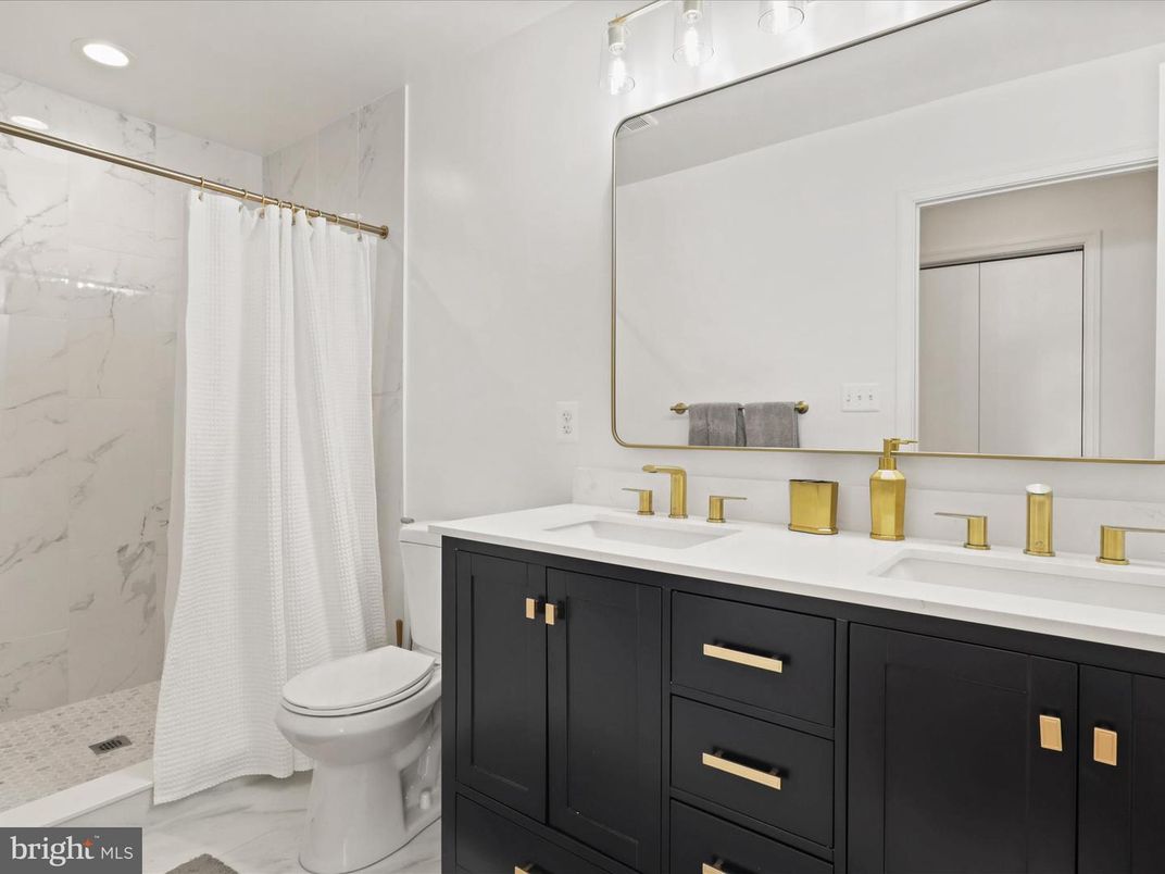 Bathroom, Dual Sink Vanities, Interior, Marble, Marble Walls, Recessed Lighting
