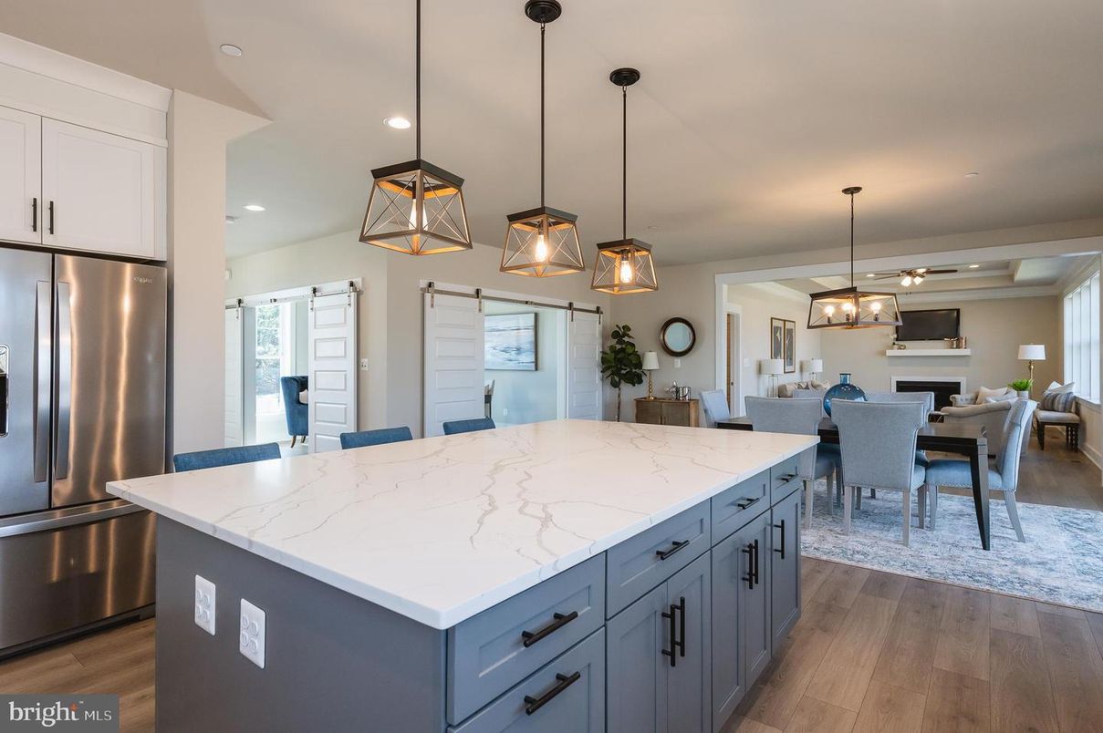 Dining room, Interior, Kitchen, Pendant Lights, Recessed Lighting, Stainless Steel Appliances, Wood Texture Flooring