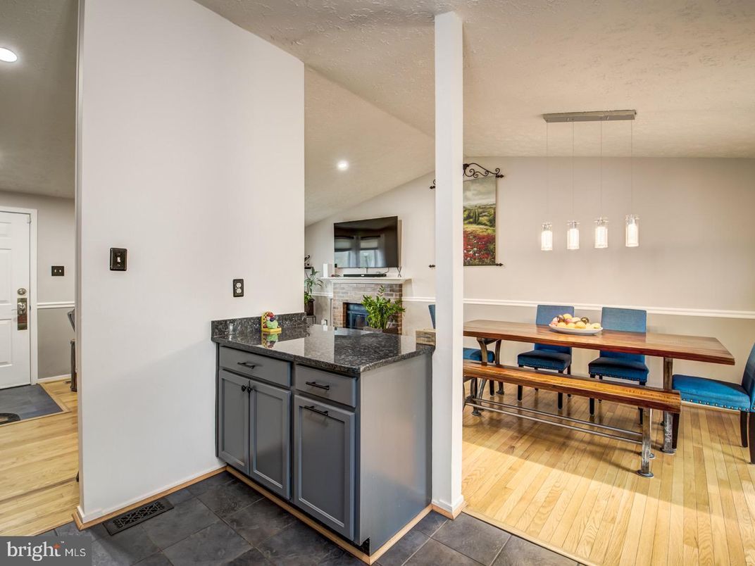 Dining room, Fireplace, Interior, Pendant Lights, Recessed Lighting, Wood Texture Flooring