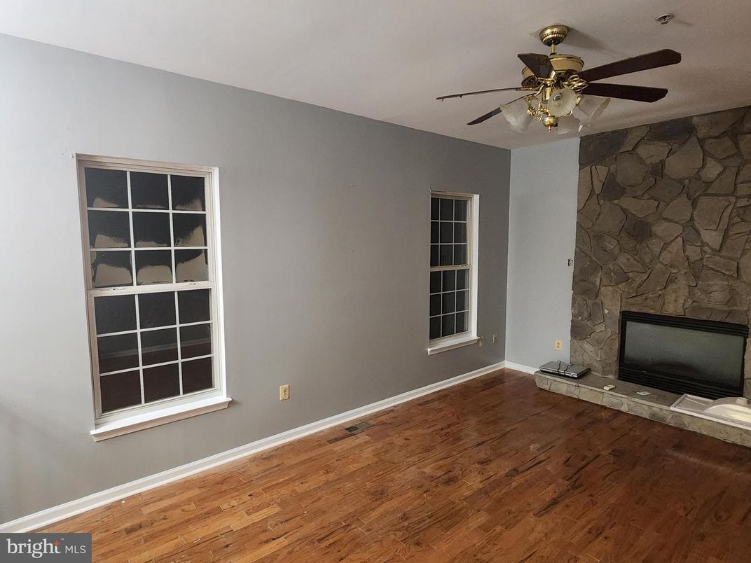 Empty room, Fireplace, Interior, Stone Walls, Wood Texture Flooring