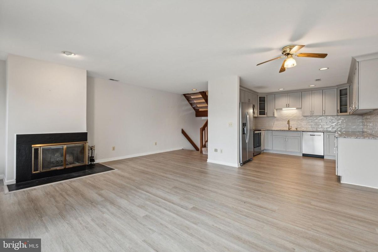 Fireplace, Interior, Kitchen, Recessed Lighting, Stainless Steel Appliances, Wood Texture Flooring