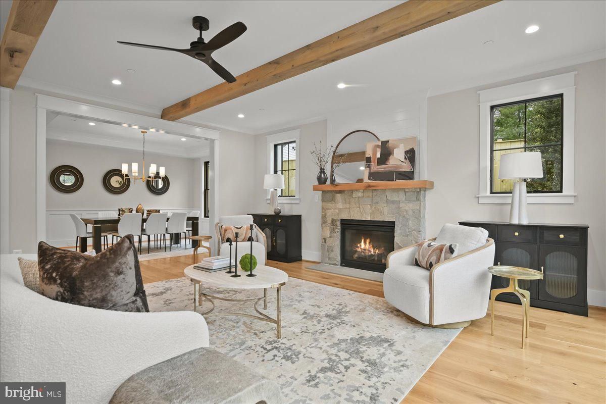 Chandelier, Dining room, Fireplace, Interior, Living room, Pendant Lights, Recessed Lighting, Wooden Beams, Wood Texture Flooring