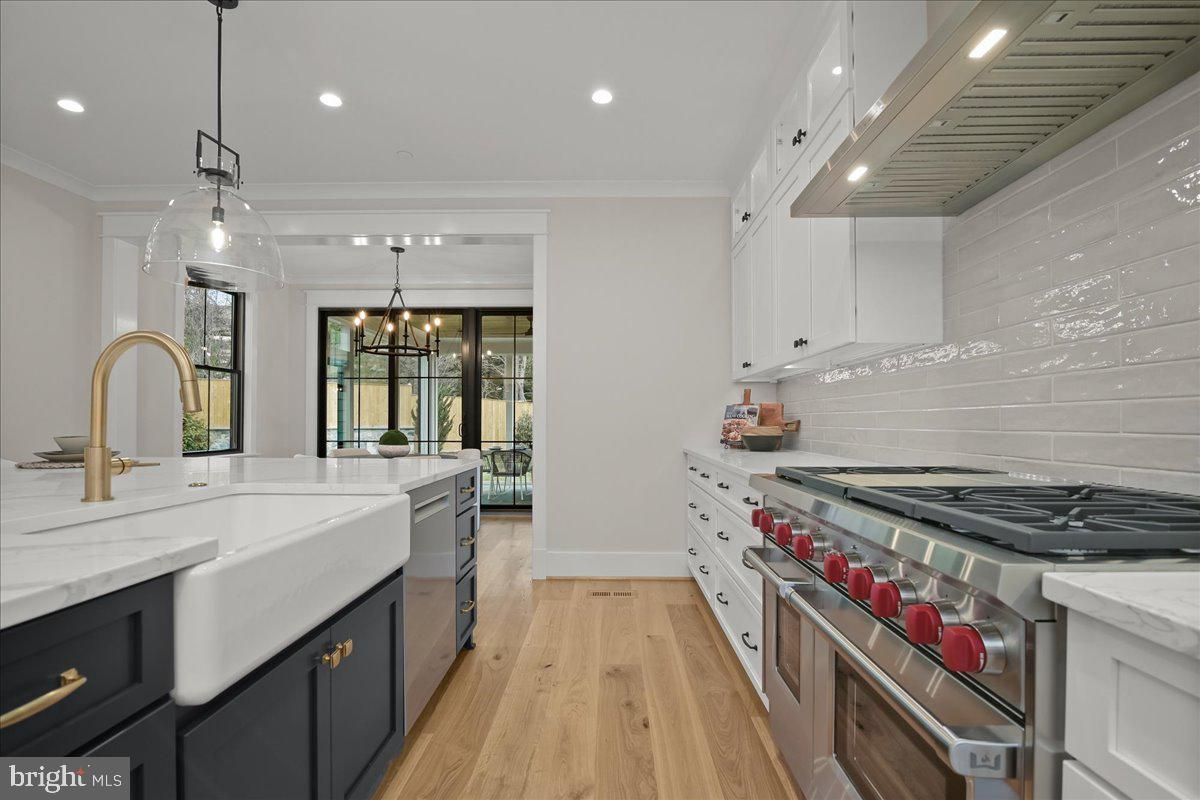 Chandelier, Interior, Kitchen, Pendant Lights, Recessed Lighting, Stainless Steel Appliances, Wood Texture Flooring