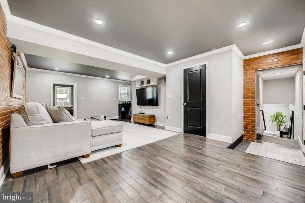Fireplace, Interior, Living room, Recessed Lighting, Stone Walls, Wood Texture Flooring, Wooden Walls