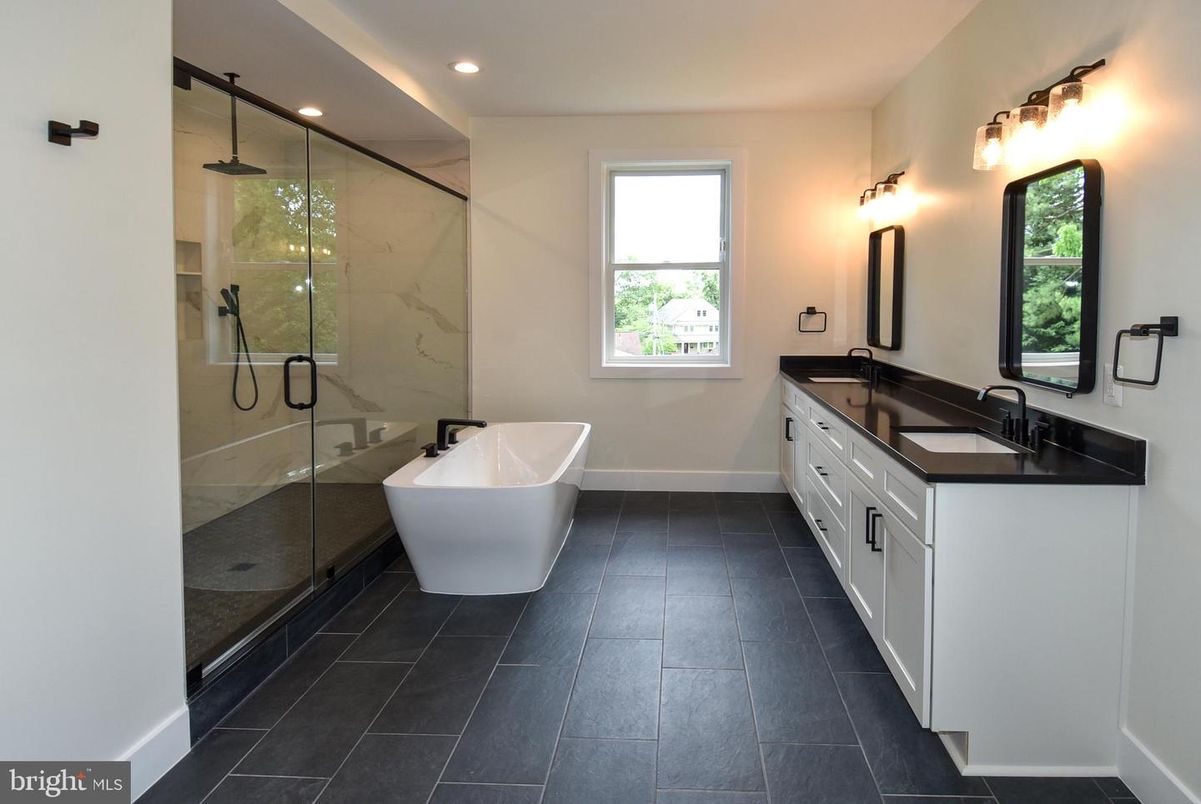 Bathroom, Dual Sink Vanities, Free Standing Baths, Glass Shower, Interior, Marble Walls, Recessed Lighting