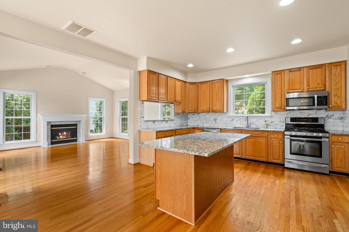 Fireplace, Interior, Kitchen, Recessed Lighting, Wood Texture Flooring