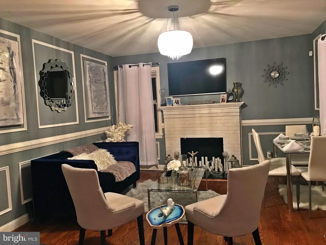 Dining room, Fireplace, Interior, Living room, Pendant Lights, Wood Texture Flooring