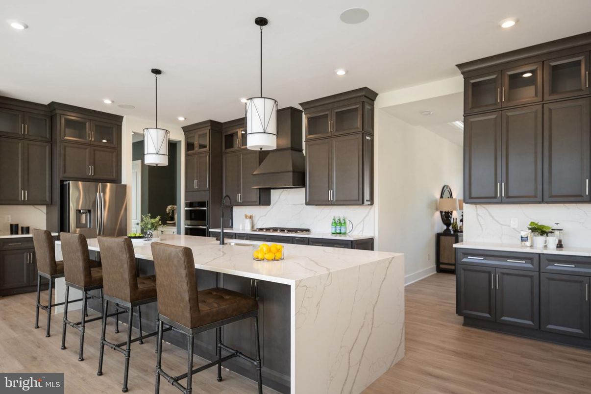 Interior, Kitchen, Marble Walls, Pendant Lights, Recessed Lighting, Stainless Steel Appliances, Wood Texture Flooring