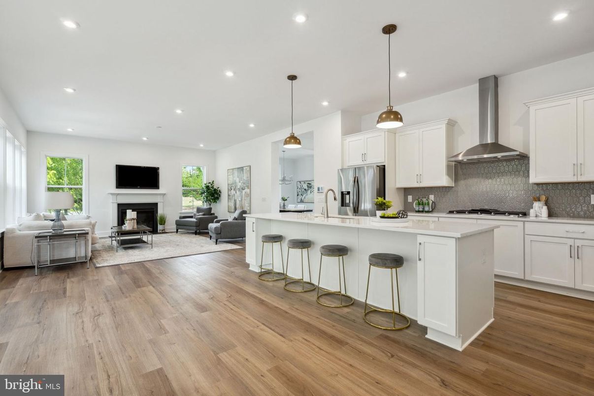 Fireplace, Interior, Kitchen, Living room, Pendant Lights, Recessed Lighting, Stainless Steel Appliances, Wood Texture Flooring