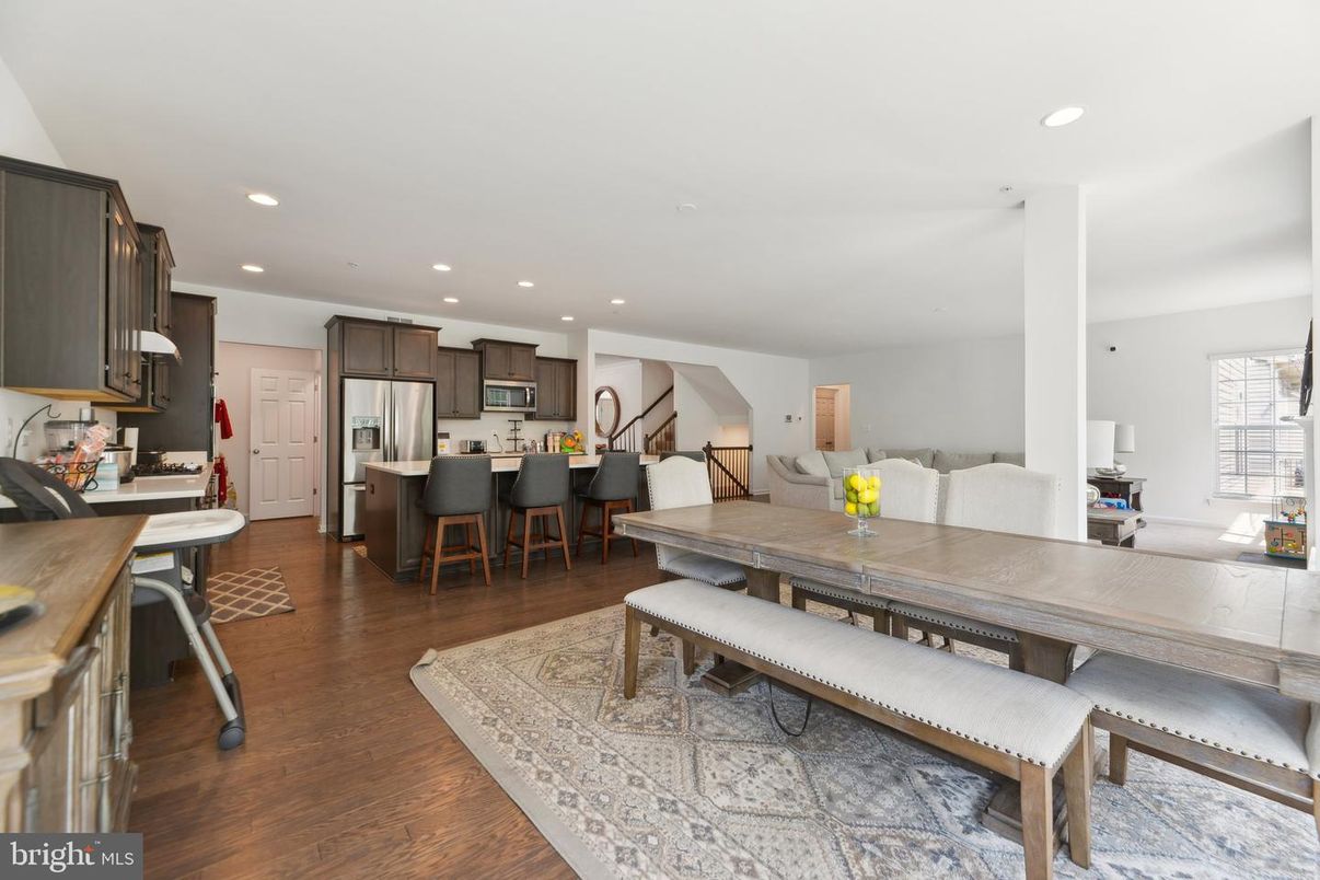 Dining room, Interior, Kitchen, Recessed Lighting, Stainless Steel Appliances, Wood Texture Flooring