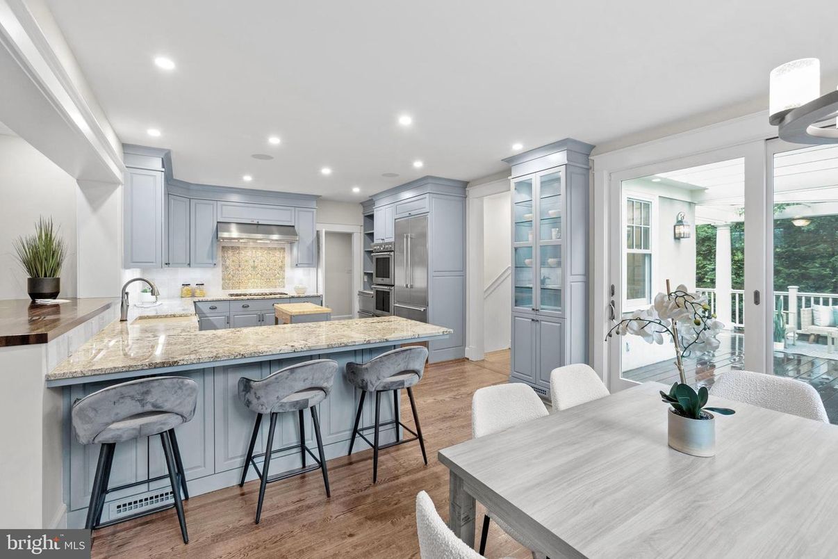 Dining room, Interior, Kitchen, Recessed Lighting, Stainless Steel Appliances, Wood Texture Flooring