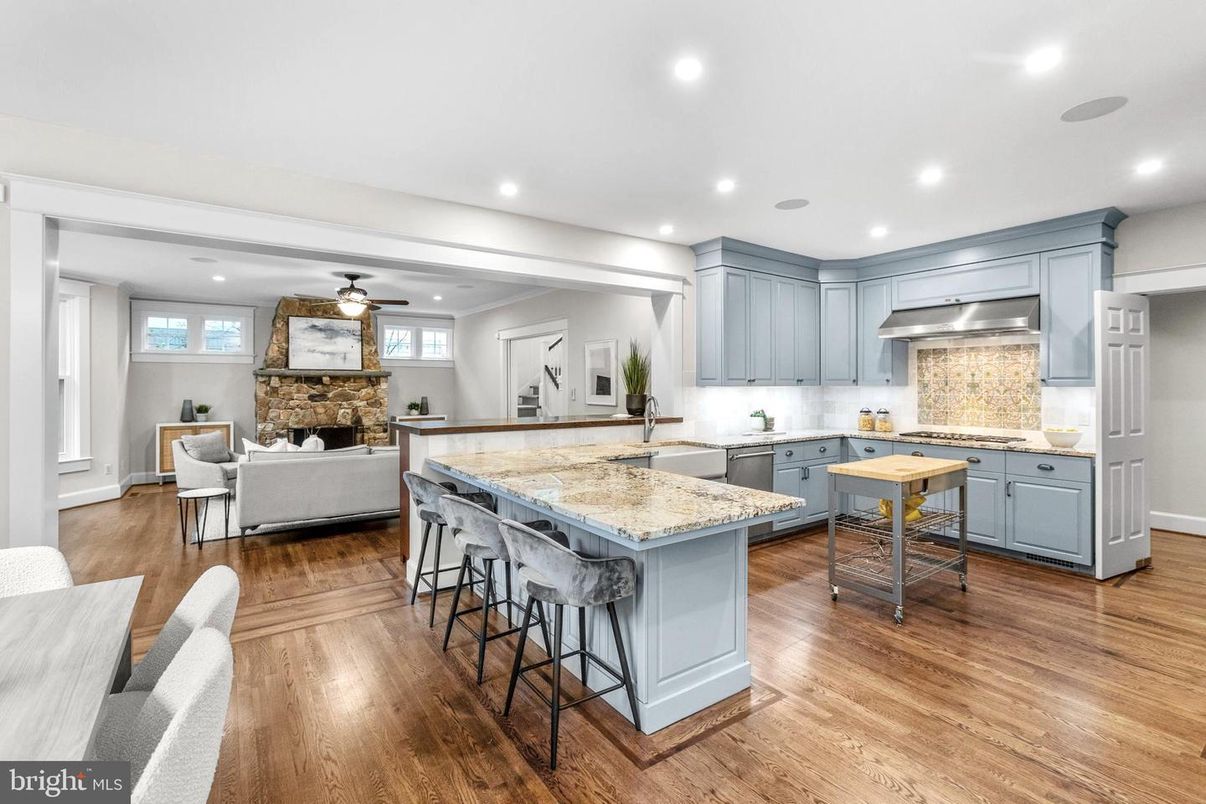 Fireplace, Interior, Kitchen, Living room, Recessed Lighting, Stainless Steel Appliances, Stone Walls, Wood Texture Flooring
