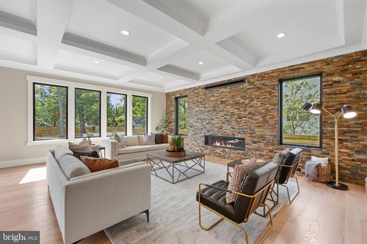 Fireplace, Interior, Living room, Recessed Lighting, Stone Walls, Wood Texture Flooring