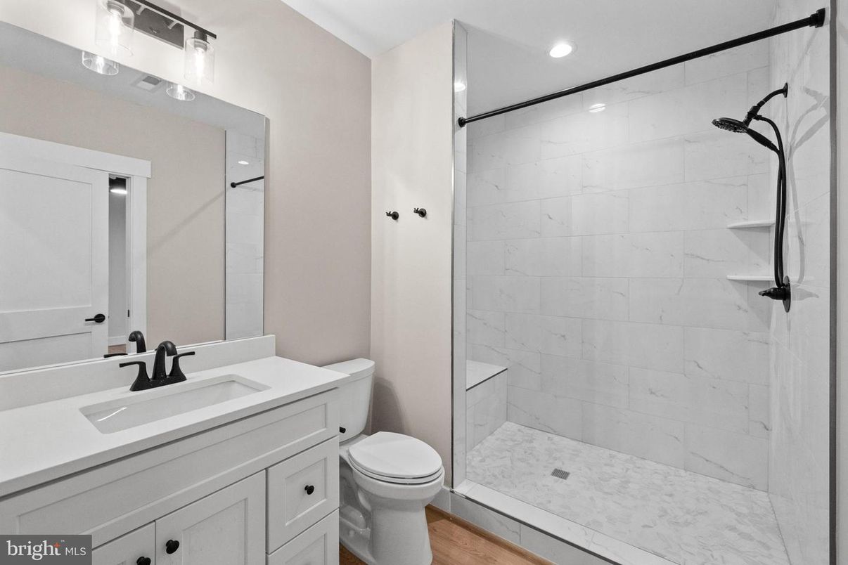 Bathroom, Interior, Marble Walls, Recessed Lighting, Wood Texture Flooring
