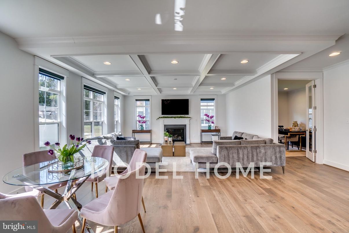 Dining room, Fireplace, Interior, Living room, Recessed Lighting, Wood Texture Flooring