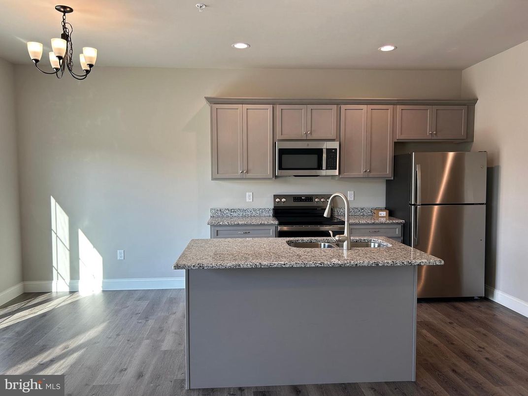 Chandelier, Interior, Kitchen, Recessed Lighting, Stainless Steel Appliances, Wood Texture Flooring