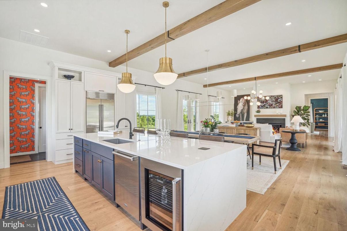 Fireplace, Interior, Kitchen, Living room, Pendant Lights, Recessed Lighting, Stainless Steel Appliances, Wooden Beams, Wood Texture Flooring