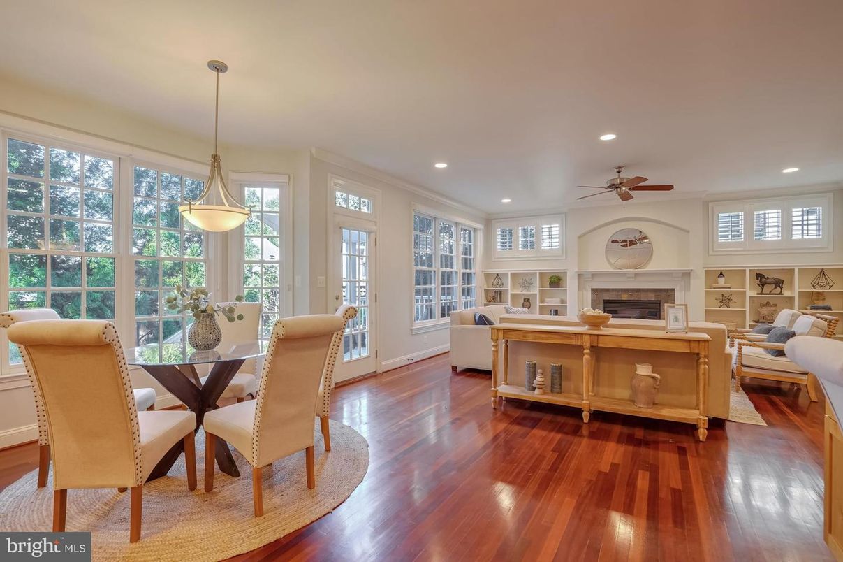 Dining room, Fireplace, Interior, Living room, Pendant Lights, Recessed Lighting, Wood Texture Flooring
