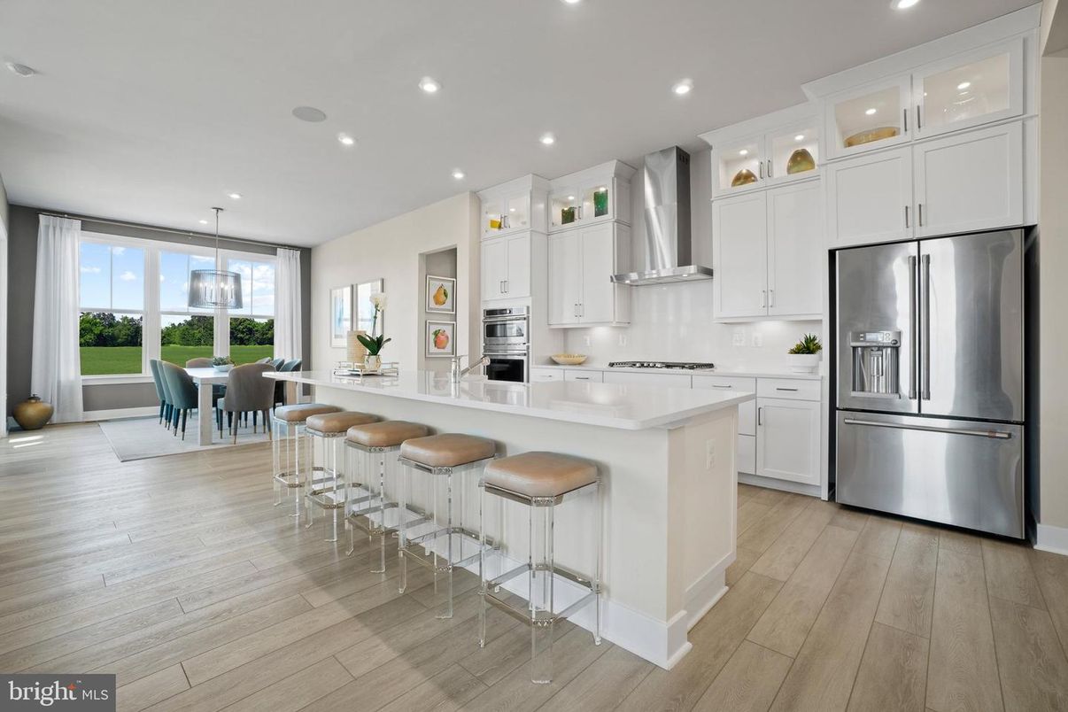 Dining room, Interior, Kitchen, Pendant Lights, Recessed Lighting, Stainless Steel Appliances, Wood Texture Flooring