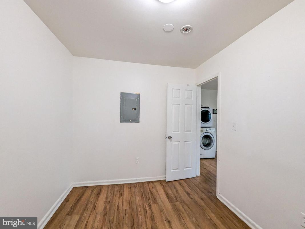 Empty room, Interior, Utility Closets, Washer, Wood Texture Flooring