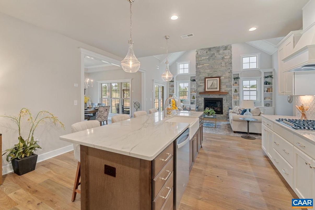 Dining room, Fireplace, Interior, Kitchen, Living room, Pendant Lights, Recessed Lighting, Stone Walls, Wood Texture Flooring